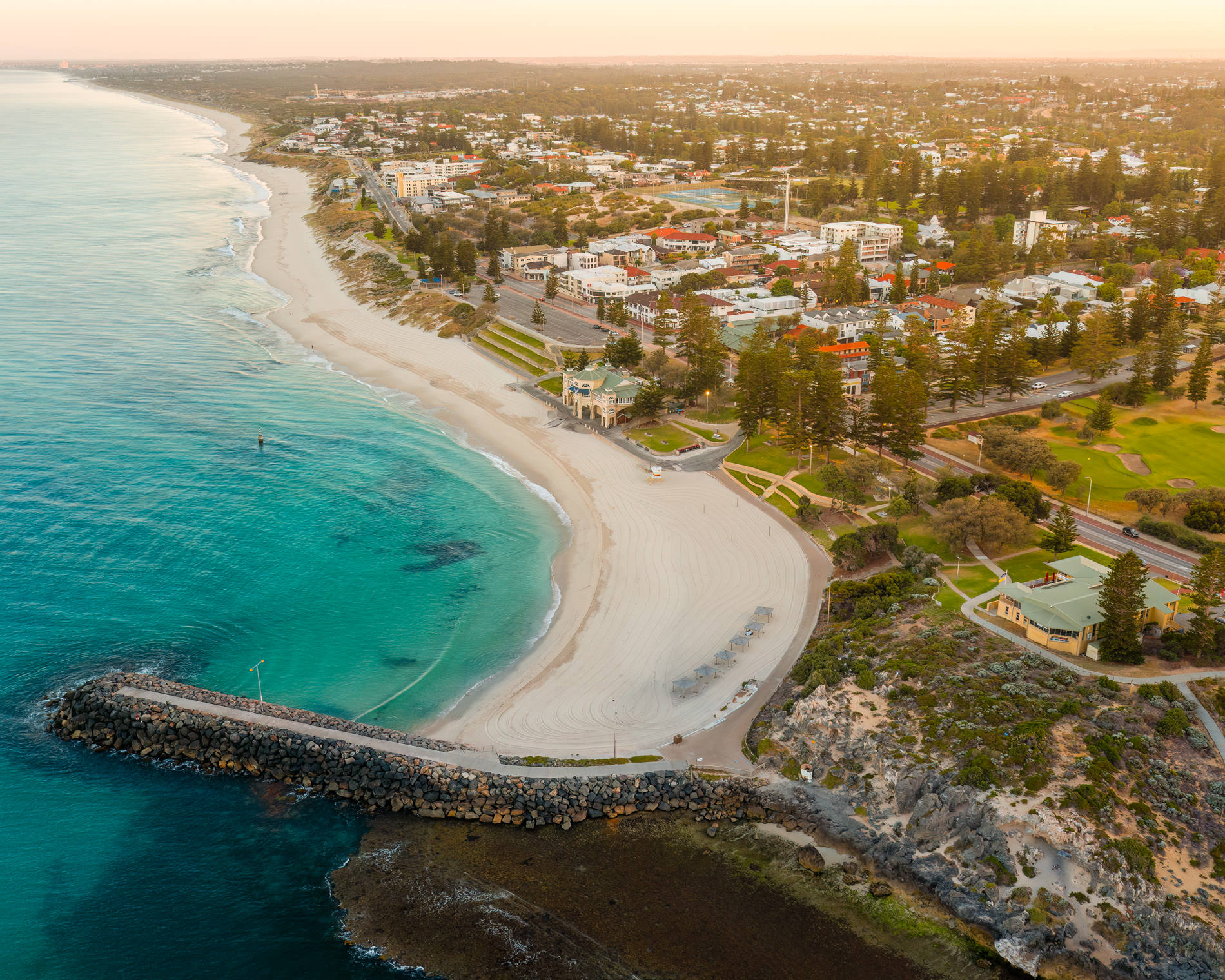 Cottesloe beach at golden hour from the sky
